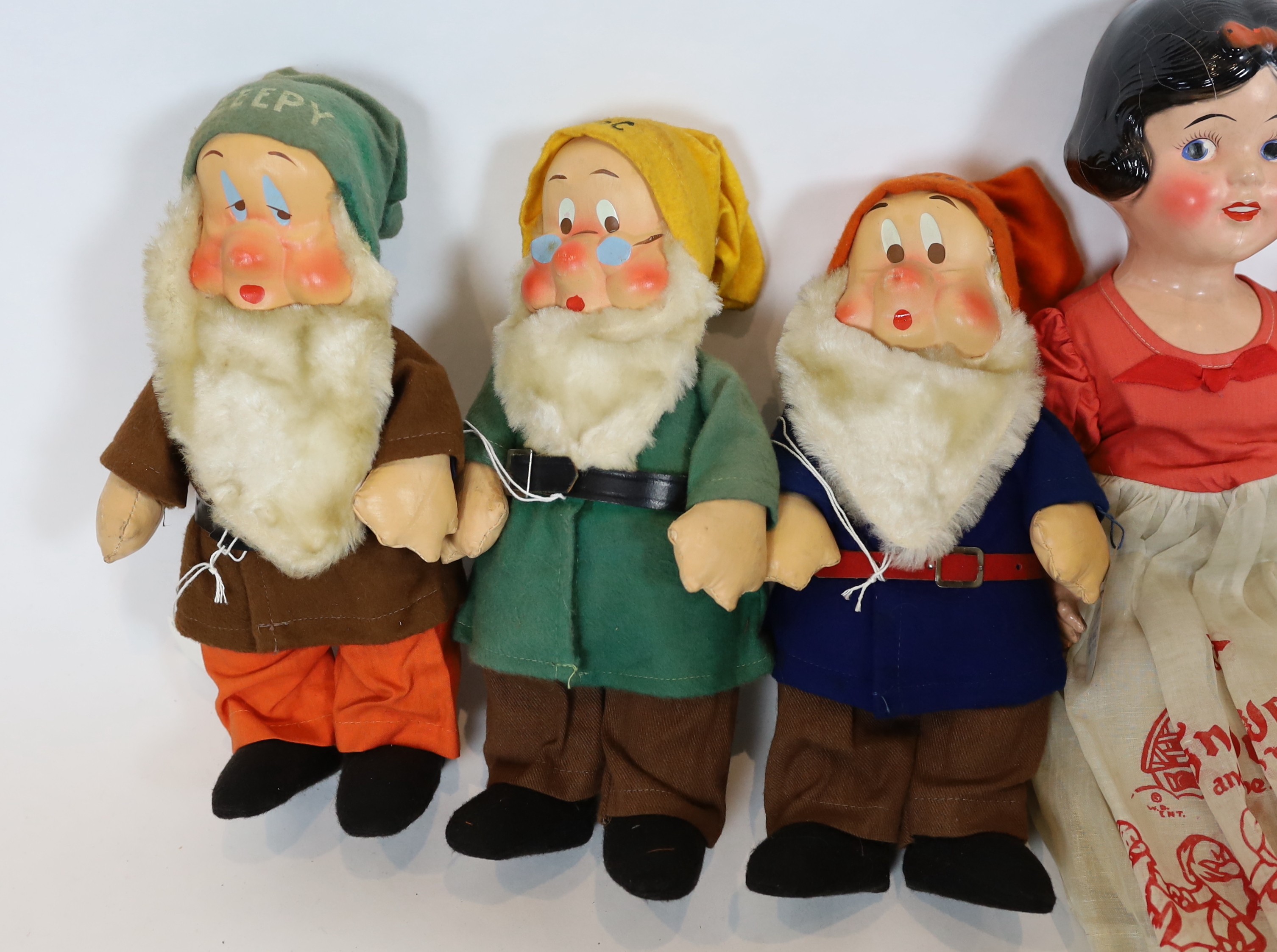 Snow White and the Seven Dwarfs, Ideal Novelty and Toy Co., US., copyright 1937, painted composition with coloured felt clothing, each rare in original box